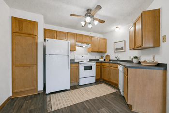 Champlin drive ample countertop & maple cabinet space at elm creek